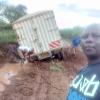 Oh my! Site is remote area. Delivering building supplies   to the site on modern Kenya highway.
Man in picture is former student we taught at Churo Secondary School in 2000.  Now a pastor that helps us with projects.