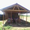 School had one block classroom.  Shelter was added to end of block classroom.