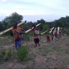 Nearing the village. Notice some of the mothers carrying babies as they carried the supplies for 3 hours.