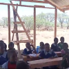 Students in completed shelter.  Notice homemade ladder for building in picture. 